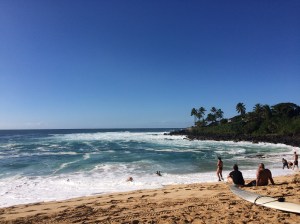 Surfers at Waimea Bay