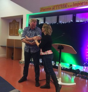 Comic improvisers, Sarah Kinsella and Russell Fletcher, taking care of baby.